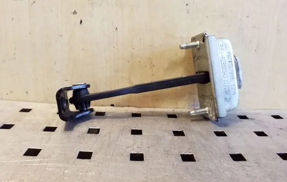 Rear door check strap stopper