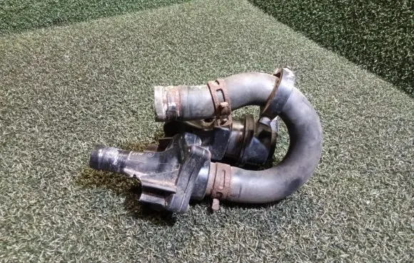 Thermostat/thermostat housing