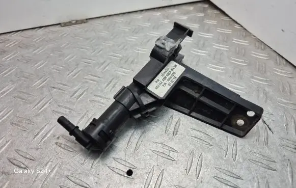 Headlight washer spray nozzle