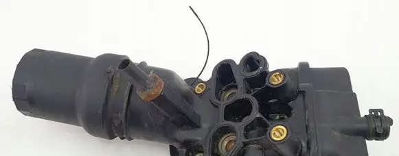 Skoda Octavia Mk2 (1Z) Oil filter mounting bracket 06D115397D BLX
