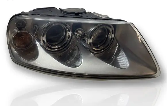 Volkswagen Touareg I Headlight/headlamp 7L6941016BK 89307861
