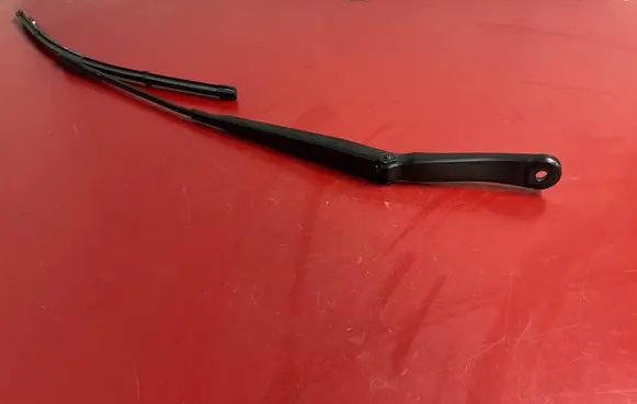 Front wiper blade arm