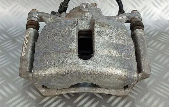 Volkswagen Golf VII Front brake caliper 