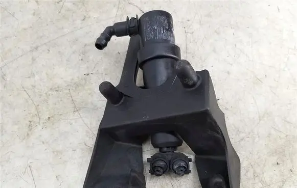 Mazda 5 Headlight washer spray nozzle 