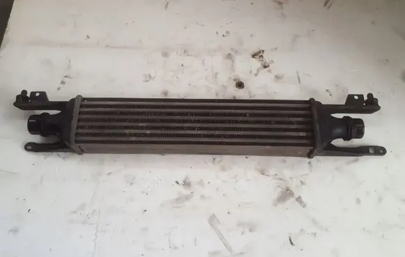 Opel Corsa D Intercooler radiator 55702194