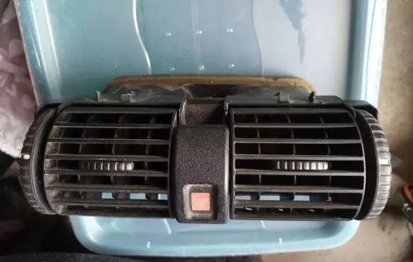 Opel Astra G Dash center air vent grill 90560344