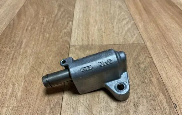 Volkswagen Touareg II Timing belt/chain tensioner 059109467AJ