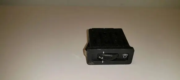 Headlight level height control switch
