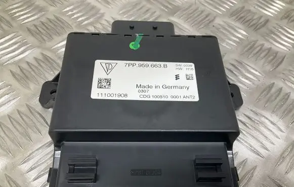 Volkswagen Touareg II Voltage converter/converter module 7PP959663B