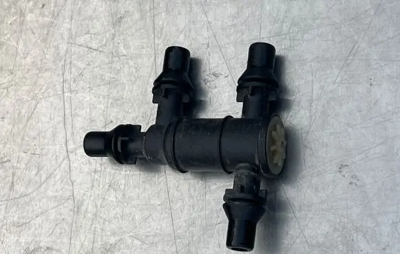 Coolant heater control valve