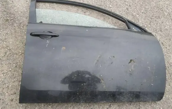 Nissan Primera Front door pilkos