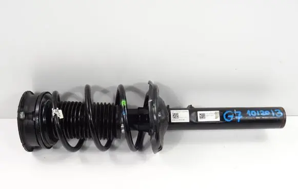 Volkswagen Golf VII Front shock absorber with coil spring 5Q0413023FJ 5Q0412014MF