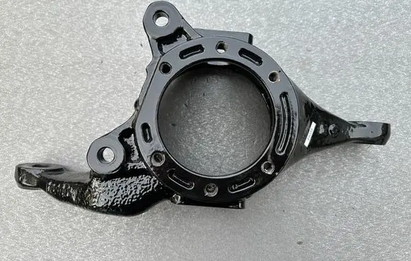 Front wheel hub spindle knuckle
