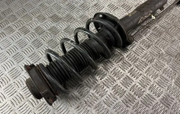 Volkswagen Touran I Front shock absorber with coil spring