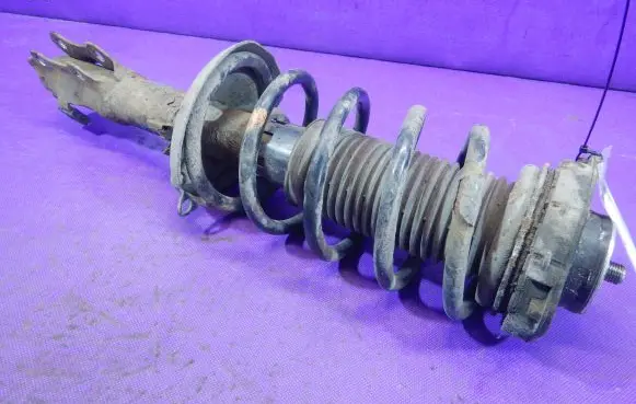 Front shock absorber with coil spring