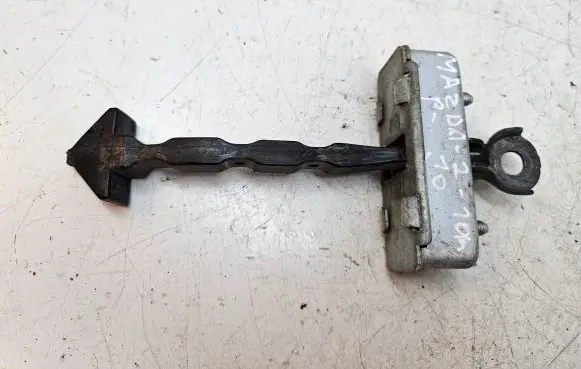 Mazda 2 Front door check strap stopper 