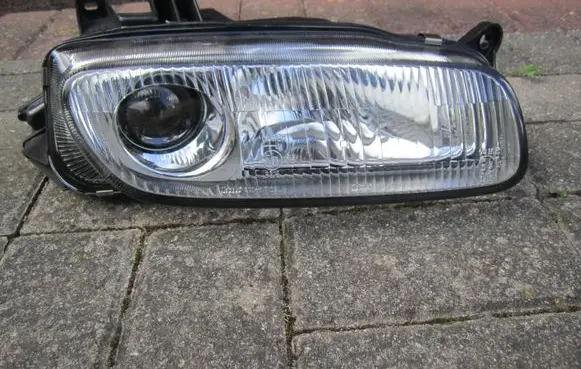 Mazda 323 F Headlight/headlamp 11061708