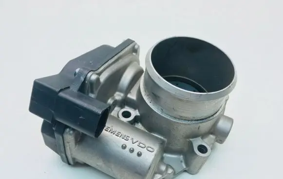 Volkswagen Golf V Throttle valve 06F133062G A2C53044094
