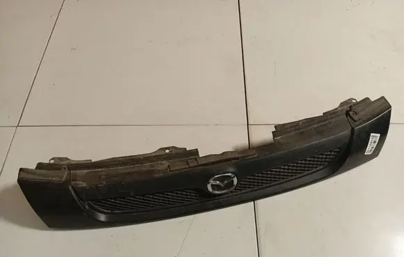 Mazda 323 Front grill B21H50712