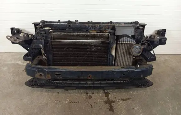 Radiator support slam panel
