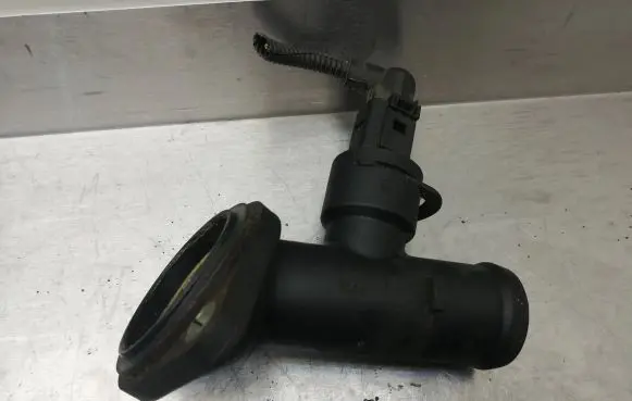 Volkswagen PASSAT B6 Engine coolant pipe/hose 03G121121D 1J0973702