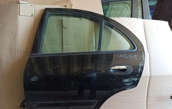 Nissan Almera N16 Rear door