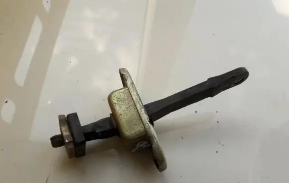 Mitsubishi Pajero Front door check strap stopper 
