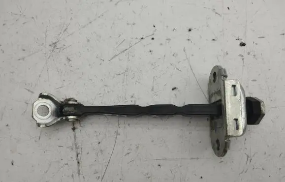 Front door check strap stopper