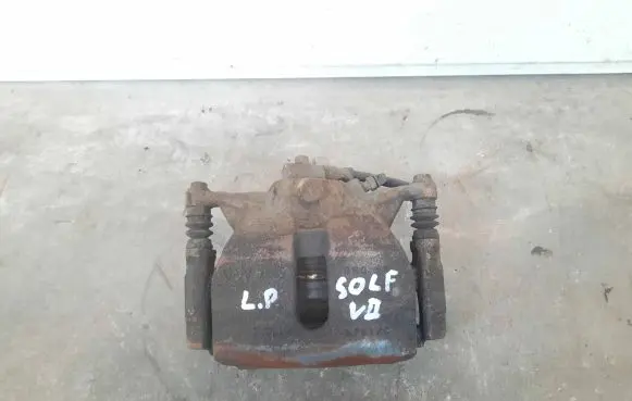 Volkswagen Golf VII Front brake caliper
