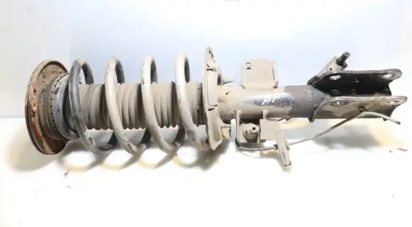 Front shock absorber with coil spring