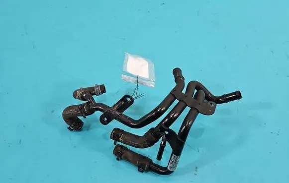 Seat Leon (5F) Engine coolant pipe/hose 04L121064AC IMPRK1518513