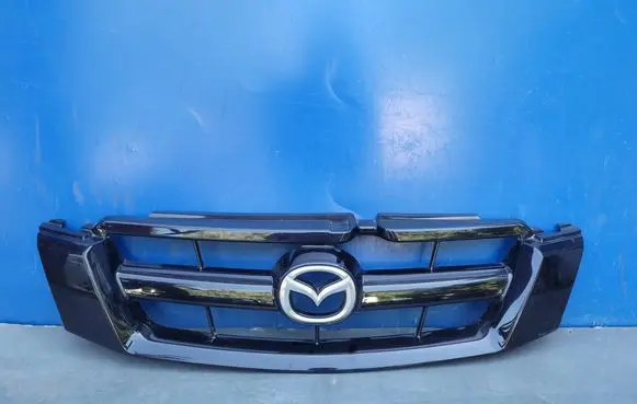 Mazda Tribute Front bumper upper radiator grill 5T248150 5T248150BAW