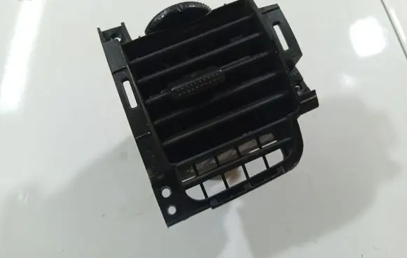 Dash center air vent grill