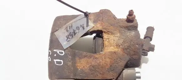 Volkswagen Golf IV Front brake caliper