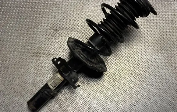 Front shock absorber with coil spring