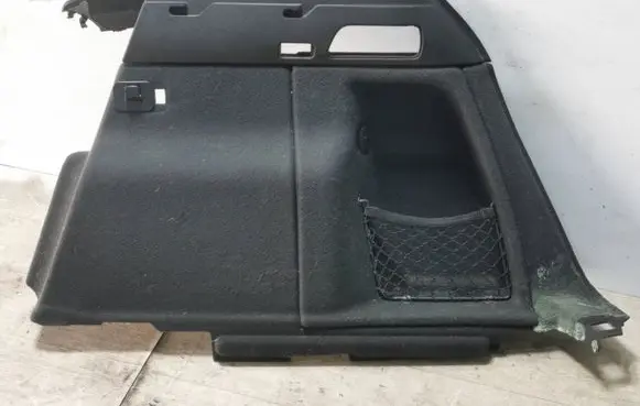 Trunk/boot lower side trim panel