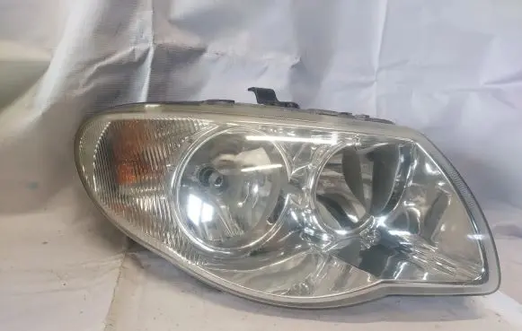 Chrysler Voyager Headlight/headlamp 04857830AB