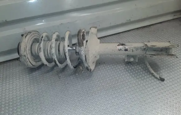 Nissan X-Trail T30 Rear shock absorber with coil spring 