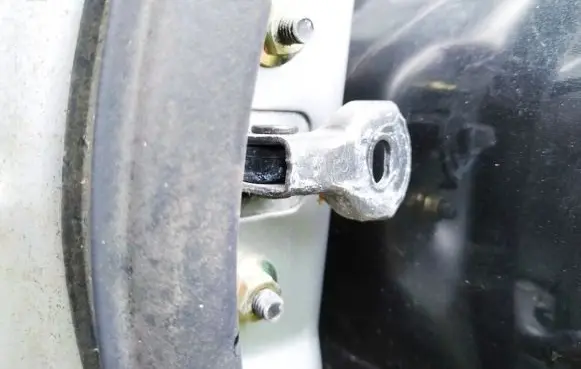 Mazda Premacy Rear door check strap stopper