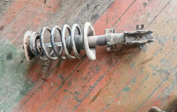 Front shock absorber with coil spring