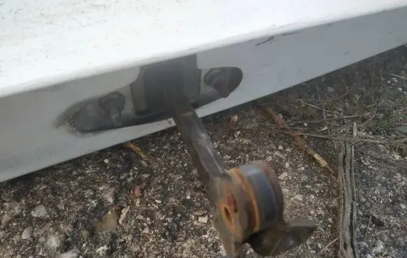 Rear door check strap stopper