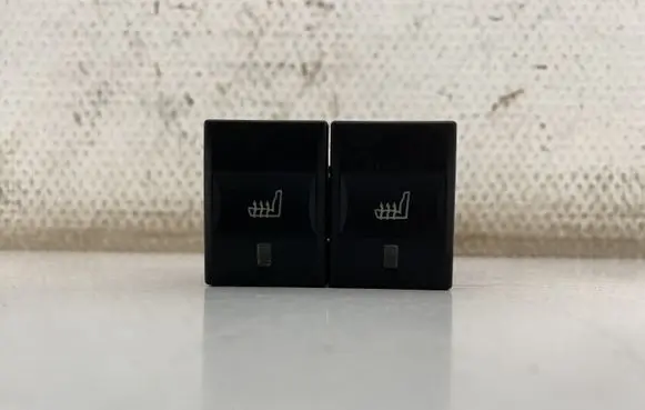 Seat heating switch