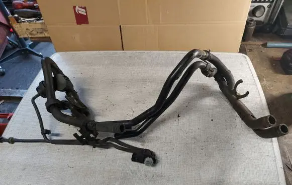 Volkswagen Touareg I Engine coolant pipe/hose 7P6121070K