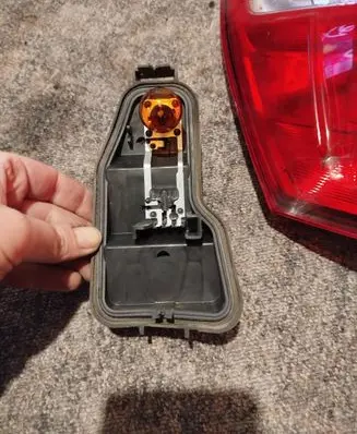Nissan Qashqai+2 Tail light bulb cover holder 89503174