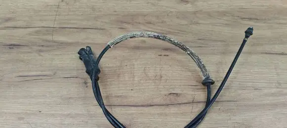 Volkswagen Touareg I Engine bonnet/hood lock release cable 7L6823535