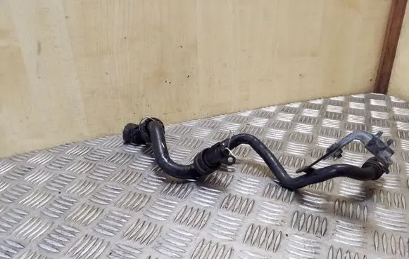 Volkswagen Touareg I Engine coolant pipe/hose 059121065AK