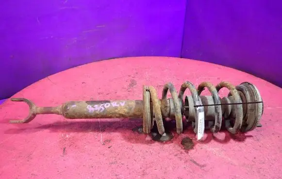 Volkswagen PASSAT B5 Front shock absorber with coil spring