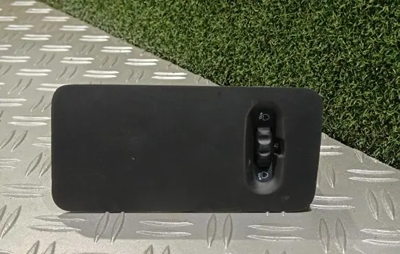 Headlight level height control switch