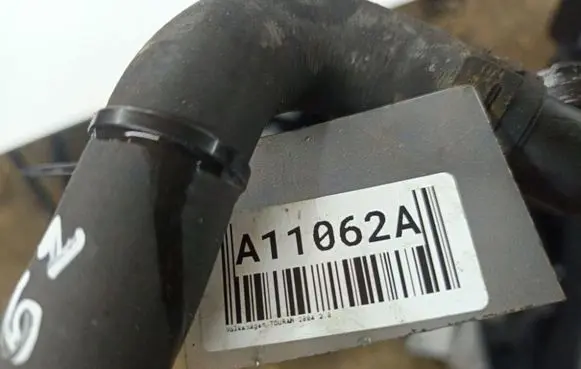 Volkswagen Touran I Engine coolant pipe/hose A11062A
