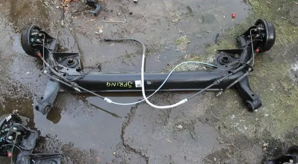 Dacia Spring Rear axle beam 
